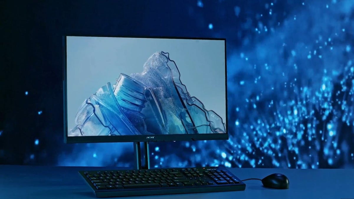Acer Vero di PC di depan latar belakang percikan air